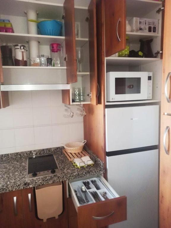Fantástico ático con terraza, garaje, wifi, con todo para playa, piscina y casa y no facturar maletas! El Portil Exterior foto